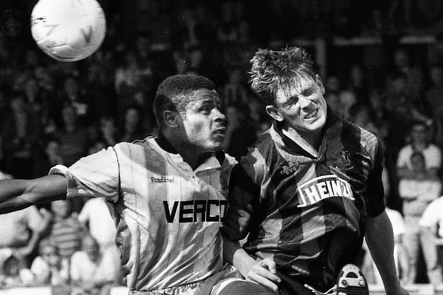 Wigan Athletic forward Pat Gavin wins a header against Wycombe Wanderers in a 3rd division match at Springfield Park on Saturday 28th of August 1993.
Latics drew 1-1 with Paul Rennie scoring.