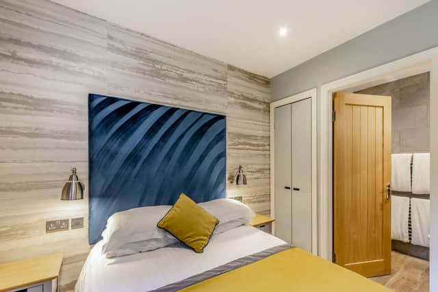 The Troutbeck cottage has three bedrooms including an en-suite double leading onto a furnished terrace with hot tub