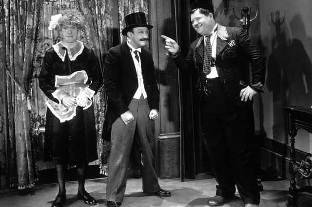Stan and Ollie in the film Another Fine Mess along with their nemesis Jimmy Finlayson