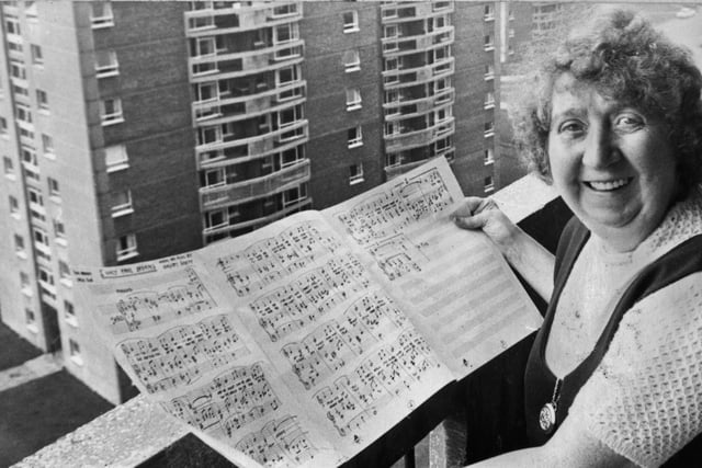 Widow Dorothy Skett who began writing songs because of the loneliness of life in the Brookhouse tower block flats in Wigan.
Mrs. Skett said that when she moved into the flats she was very lonely so a relative who knew she liked playing the piano got one for her as company and that's how she started composing.  Her songs became favourites in the clubs in 1973.