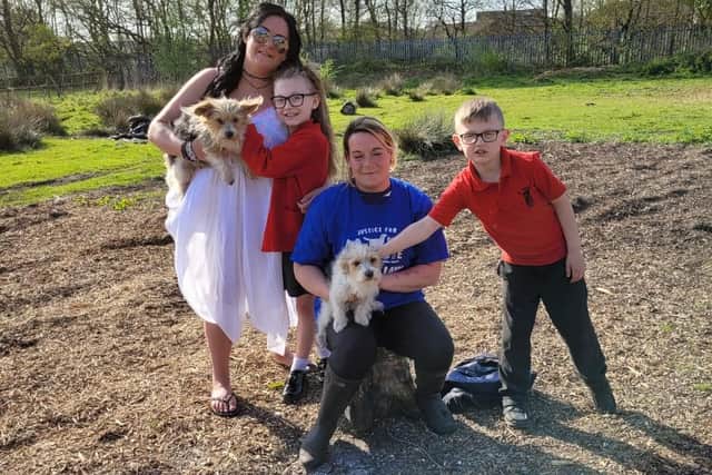 Katie Shakeshaft pictured (centre), with her sister, Nicola (left), and neice, Frankie, Nephew, louie and her dogs, Scrappy and Mopsy.