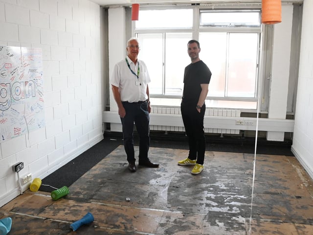 From left, Coun David Molyneux leader of Wigan Council chats with Tim Heatley founder of Capital&Centric, about ideas for the building transformation.