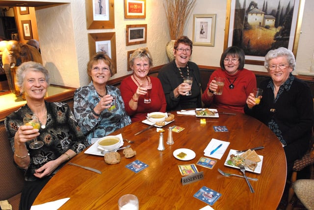Mary Grady, Janet Molyneux, Christine Lomas, Jenny Ashcroft, Helen Dean and Joan Pope, friends from Trinity Church, Skelmersdale, enjoy a Christmas meal