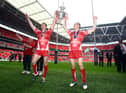 Joel Tomkins and Sam Tomkins celebrate winning the Challenge Cup in 2011
