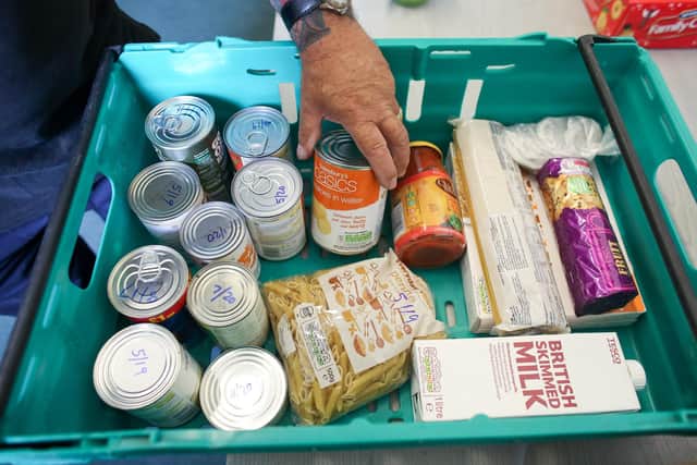 Vital everyday items being prepared to go to someone at a foodbank.
