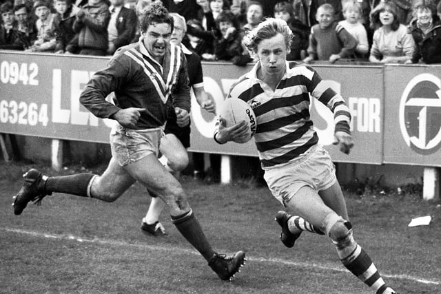 Wigan centre Dennis Ramsdale strides over for a try against St. Helens in a league match at Central Park on Sunday 25th of April 1982.
Wigan won 23-5.