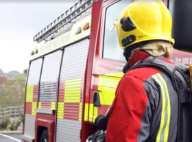 Firefighters were forced to cause damage to the interior of the home in order to get at a blaze in the wall cavity