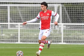 Omar Rekik in action for Arsenal