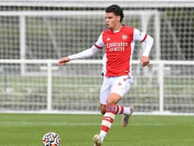Omar Rekik in action for Arsenal