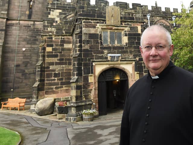 The Rector of Standish, Rev Andrew Holliday outside St Wilfrid's Church which is to open its doors for tours
