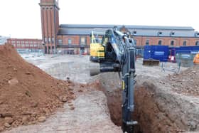 Digging deep: one of the trenches being created by archaeologists on the site of the former Galleries shopping centre in Wigan
