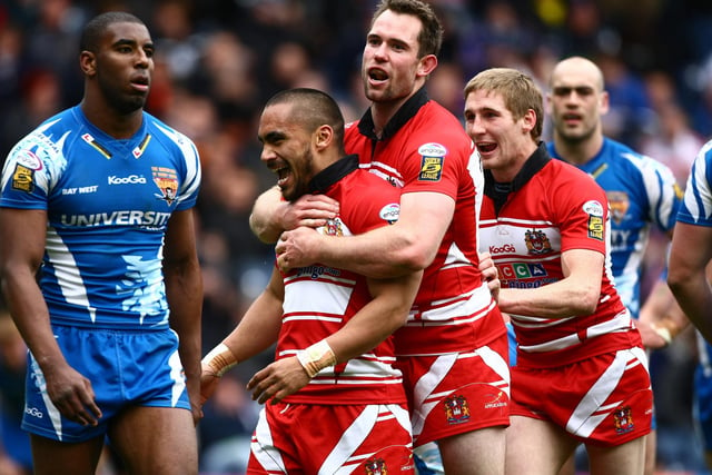 Richards celebrates with Thomas Leuluai during the 2010 Magic Weekend victory over Huddersfield Giants at Murrayfield.