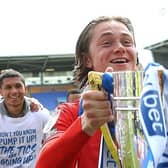 Thelo Aasgaard celebrates on the pitch at Shrewsbury