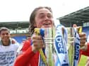 Thelo Aasgaard celebrates on the pitch at Shrewsbury