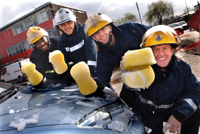 2007  - Wigan fire fighters, Mike Samuels, Martyn Smith, Phill Capstick and Brian Cattrell with sponges at the ready for their charity car wash in aid of the Fire Services National Benevolent FundRichard