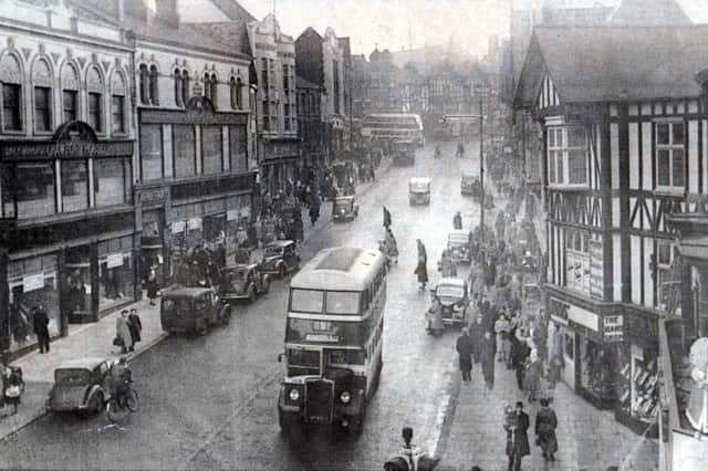 1950 - Standishgate, Christmas 1950.  Note the two-way traffic and parking and Pendlebury's Crawford House, left, which four years later was gutted by fire.