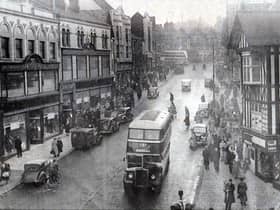 1950 - Standishgate, Christmas 1950.  Note the two-way traffic and parking and Pendlebury's Crawford House, left, which four years later was gutted by fire.