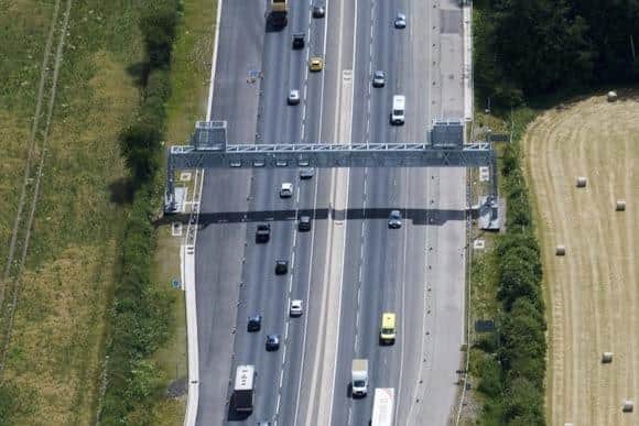 New image of the upgrade work on the M6, with the installation of new refuge areas and signs on gantries