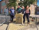 (L-R) Coun Chris Ready, volunteer Brian Muscroft, Coun Ron Conway and Coun Laura Flynn with the Moot Hall slab