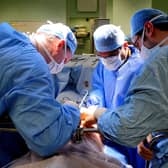 The Royal College of Surgeons of England said no surgeon wants to cancel operations, but high demand and the lack of social care leading to a delay in discharging patients has made this impossible.
