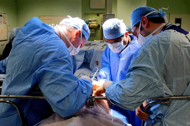 The Royal College of Surgeons of England said no surgeon wants to cancel operations, but high demand and the lack of social care leading to a delay in discharging patients has made this impossible.