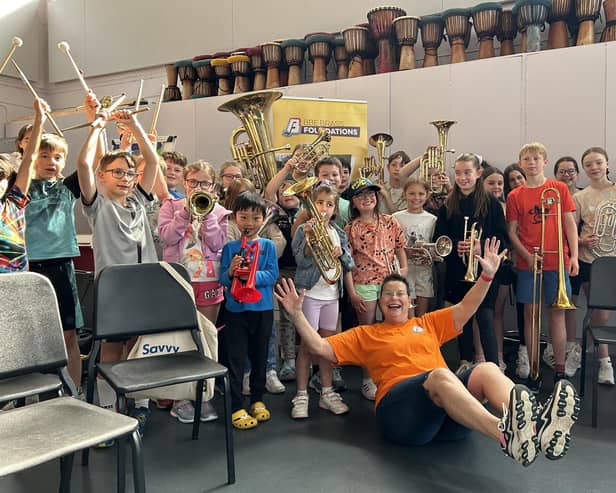 Helen Minshall has fun at a Stockport Schools brass band workshop earlier this year