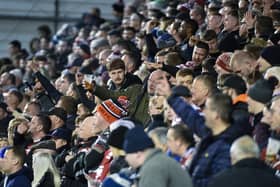 Wigan fans made the trip to the Halliwell Jones Stadium to show their support for Matty Peet's side.