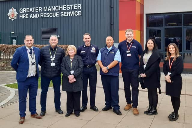 (L-R) Atherton High School headteacher Ben Layzell, Coun John Harding, Coun Debra Wailes, County Fire Officer Dave Russel, Rik Tapper and staff from Wigan Council and GMFRS Safety Centre