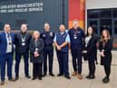 (L-R) Atherton High School headteacher Ben Layzell, Coun John Harding, Coun Debra Wailes, County Fire Officer Dave Russel, Rik Tapper and staff from Wigan Council and GMFRS Safety Centre