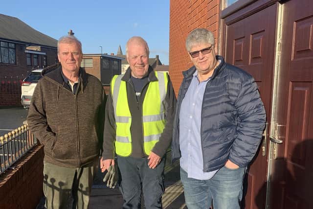 Left to right: Mike Turrisi (Charity Officer), Frank Highton, John Selley (Wigan Group Chairman)