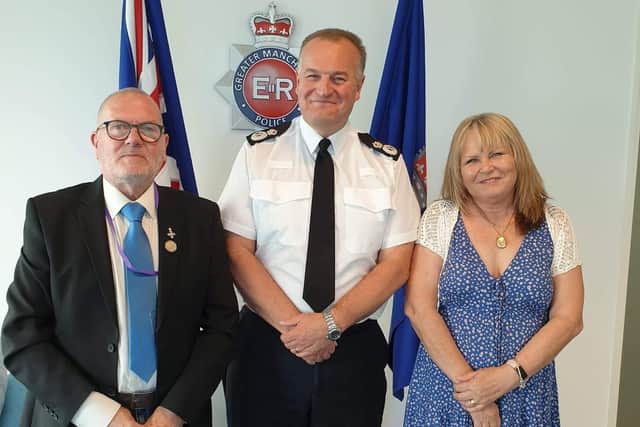 Trevor and Sheila Fairhurst with GMP Chief Constable Stephen Watson