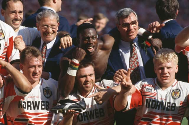 Martin Offiah celebrates with his Wigan teammates