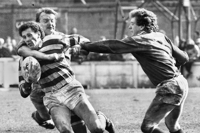 Wigan full-back Barry Williams attempts to burst through against St. Helens in the Good Friday league clash at Central Park on 1st of April 1983 which Wigan won 13-6.