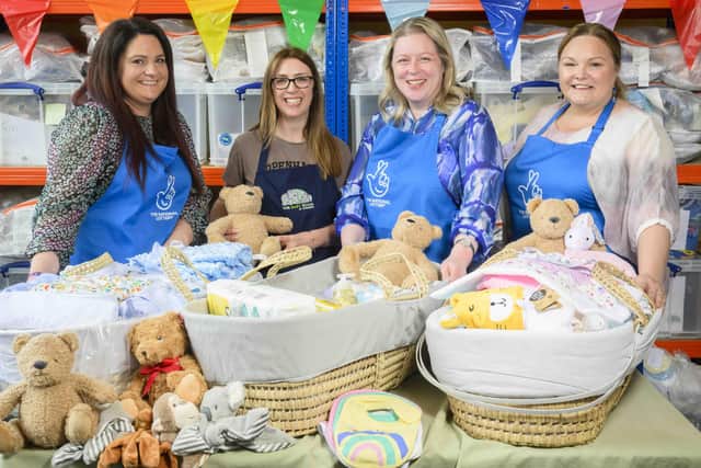 To help mark 10 years since her win, Ruth was joined by a group of fellow National Lottery winners who together assembled the perfect starter packs for new parents