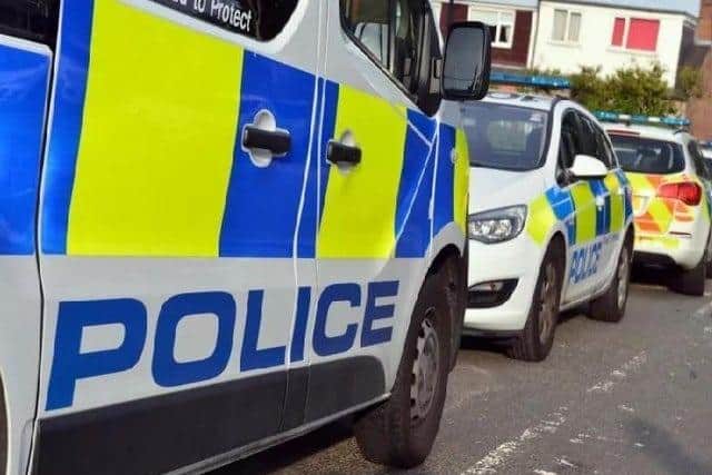 The three Wigan men have been charged with robbery after recent raids on Co-op shops in Preston and Chorley