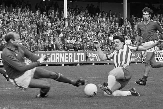 Wigan Athletic forward Mick Quinn stretches for the ball against Aldershot in a Division 4 match at Springfield Park on Saturday 30th of August 1980.
Latics won 1-0 with Jeff Wright scoring.