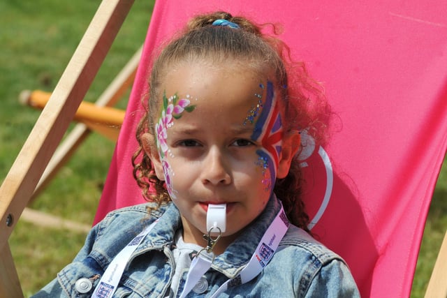 Bella Gormally, six, has fun. 
Family fun at the Jubilee Party in the Park, with food, stalls and entertainment, celebrating the Queen's platinum Jubilee at Mesnes Park, Wigan.