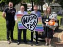 Scott Williams, from Wigan Pride, with WWL's Paul Howard and Joseph Usher, and Coun Laura Flynn