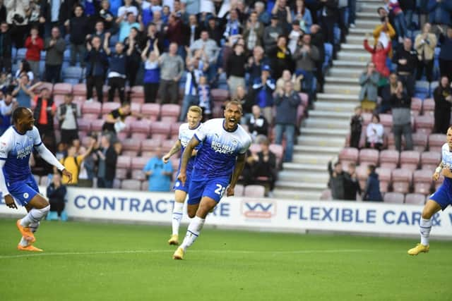 Josh Magennis celebrates his goal against West Brom