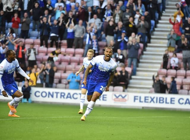 Josh Magennis celebrates his goal against West Brom