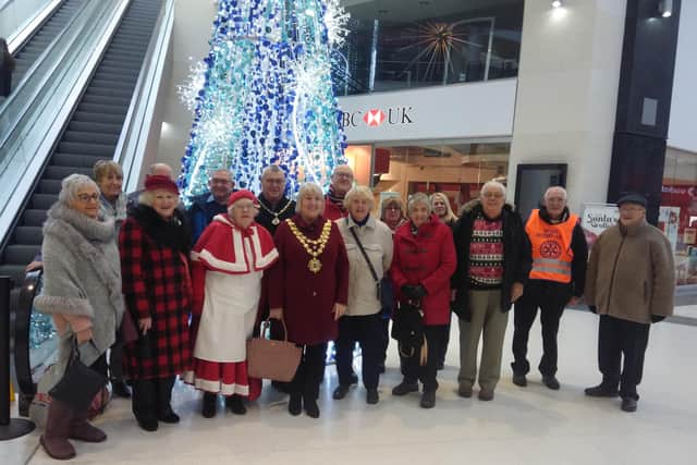 Wigan Rotary Club members at the Grand Arcade shopping centre with mayor Marie Morgan