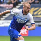 Jack Whatmough in action for Latics against Preston