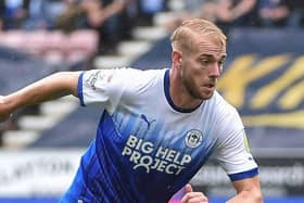 Jack Whatmough in action for Latics against Preston