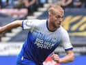 Jack Whatmough in action for Latics against Preston