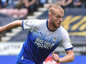 Jack Whatmough in action for Latics against Preston