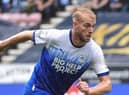Jack Whatmough in action for Latics against Preston