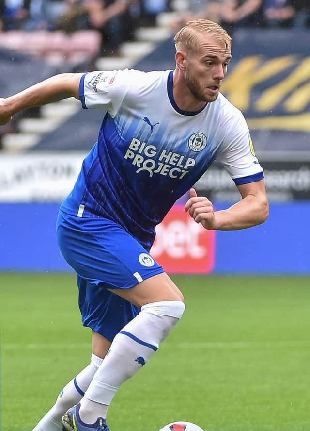 Jack Whatmough in action for Latics against Preston