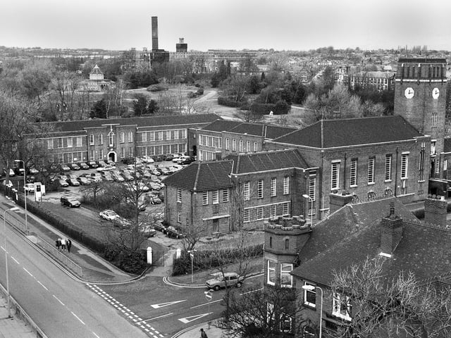 The old Wigan Grammar School pictured in March 1994 when it was at the transitory stage between being Mesnes High School and the Linacre Outpatients Centre. In the foreground is the Drumcroon Gallery with Mesnes Park and the old Rylands Mill which when it closed became John England Mail Order then Wigan Technical College's Pagefield Building. Picture by Jon Snape
