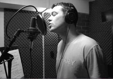 Jake Kelly recording the vocals for the cover