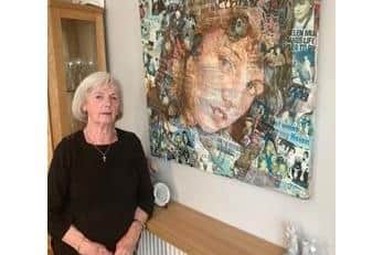 Marie McCourt at home in Billinge with a treasured picture of Helen